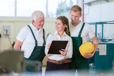 female consultant with two production staff